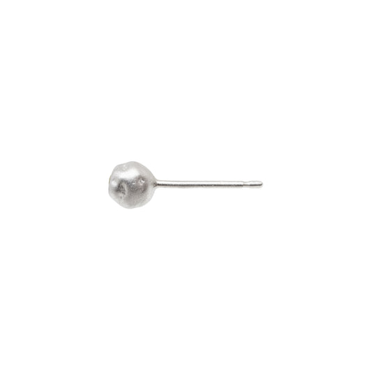 Silver ball earring on a white background