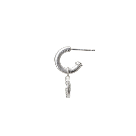 Silver hoop earring with a diamond charm on a white background
