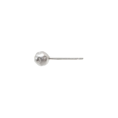 Silver ball earring on a white background