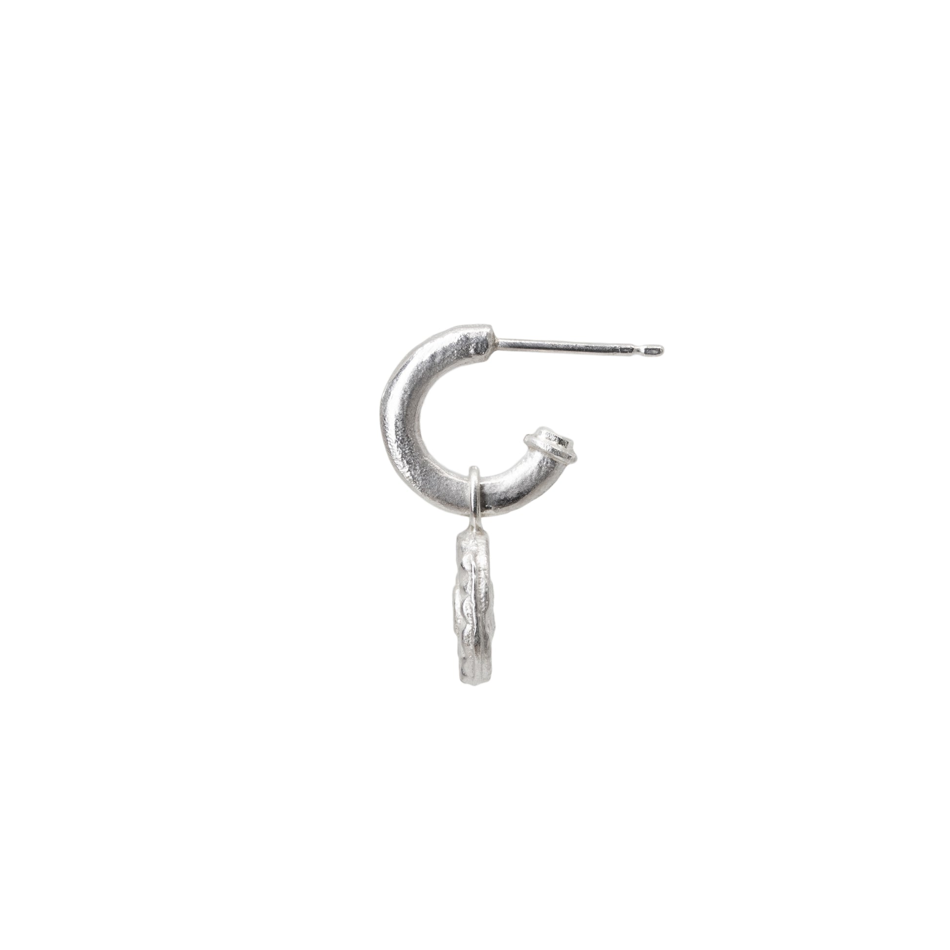 Silver hoop earring with a diamond charm on a white background