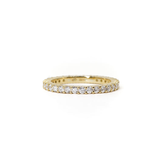 A full eternity ring in 18ct yellow gold set with lab-grown diamonds, set against a white background.