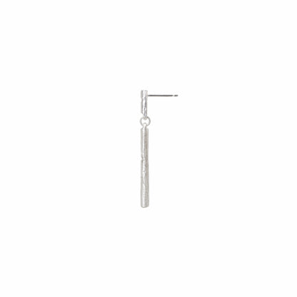 Side view of silver stud earring with diamonds on a white background