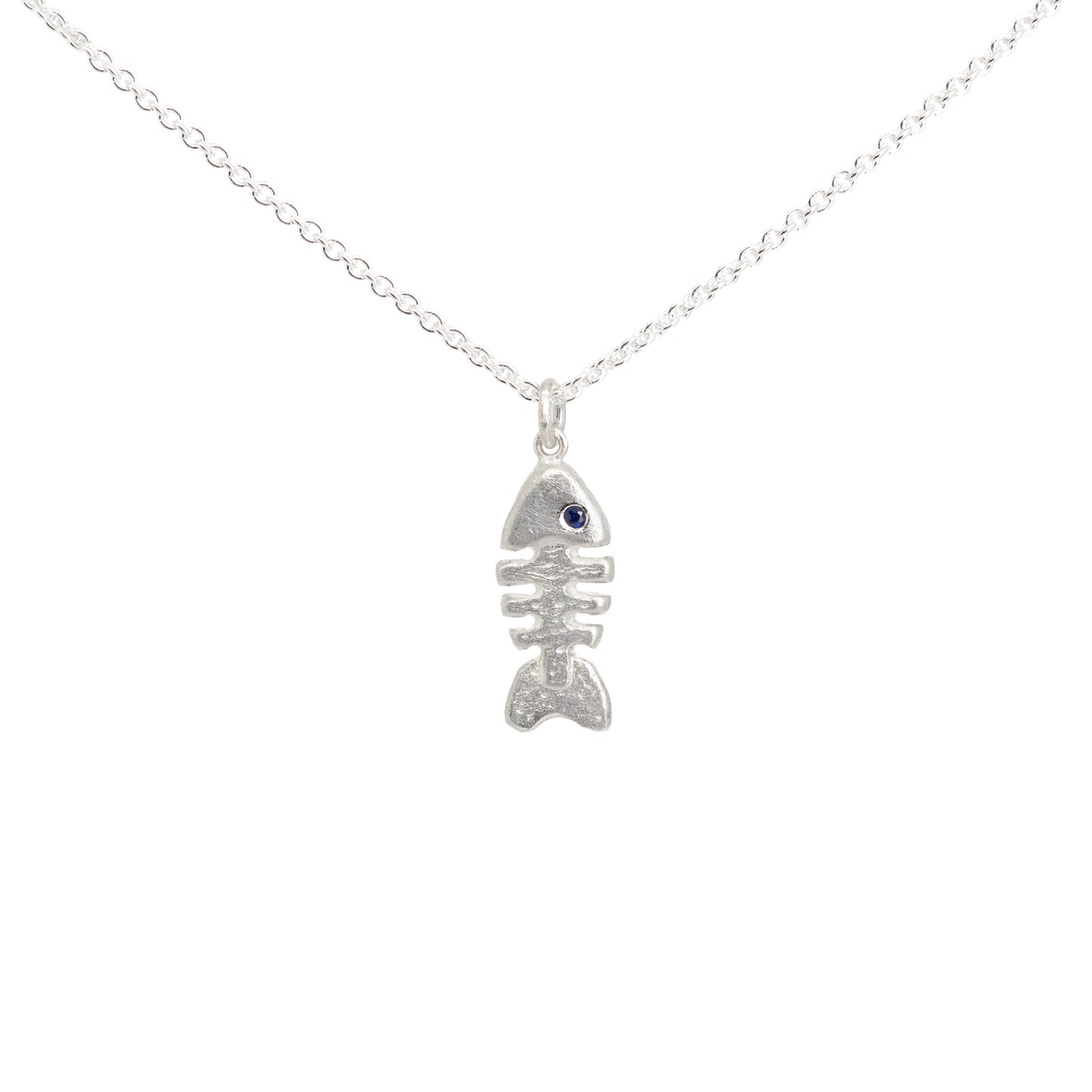 Silver fish bone skeleton necklace with a sapphire eye on a white background