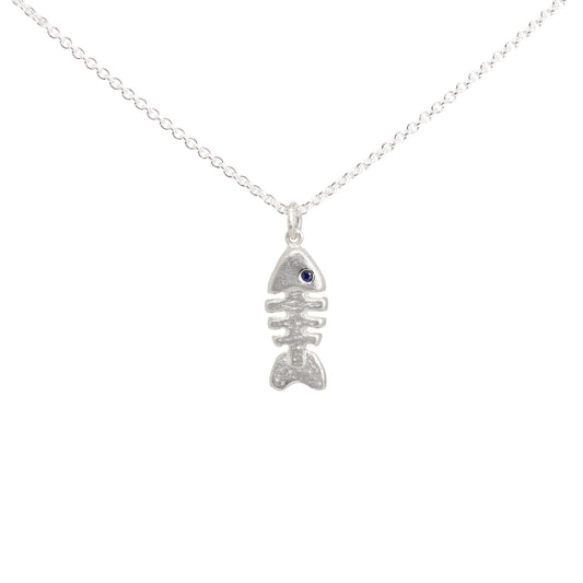 Silver fish bone skeleton necklace with a sapphire eye on a white background